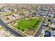 Overhead view of a neighborhood green space with lush lawns, walking paths, and inviting residential properties surrounding at 4247 S Zenith --, Mesa, AZ 85212