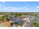 Expansive aerial view of community featuring a farm, park, pool, and neatly organized homes at 4247 S Zenith --, Mesa, AZ 85212