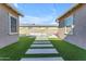 Eye-catching backyard with pool and grassy walking paths at 4247 S Zenith --, Mesa, AZ 85212