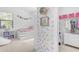Bright bedroom features a daybed with built-in storage, playful decor, and a closet for an inviting space at 4247 S Zenith --, Mesa, AZ 85212
