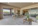 Spacious covered patio with multiple seating areas, perfect for entertaining at 4247 S Zenith --, Mesa, AZ 85212