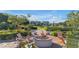 Inviting fire pit area with Adirondack chairs offering a cozy outdoor gathering spot for residents at 4247 S Zenith --, Mesa, AZ 85212