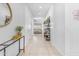 Bright hallway offering a clear view of the living room and stylish decorations, creating a welcoming transition at 4247 S Zenith --, Mesa, AZ 85212
