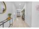 Bright hallway offering a clear view of the living room and stylish decorations, creating a welcoming transition at 4247 S Zenith --, Mesa, AZ 85212