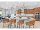 Bright kitchen with a central island, breakfast bar, and stainless steel appliances at 4247 S Zenith --, Mesa, AZ 85212