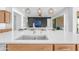 Bright kitchen features a large island with seating and modern appliances with an open floorplan at 4247 S Zenith --, Mesa, AZ 85212