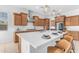 Beautiful kitchen with large island, quartz countertops, and stainless steel appliances at 4247 S Zenith --, Mesa, AZ 85212