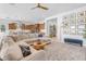 Spacious living room open to the kitchen with modern decor and ample seating at 4247 S Zenith --, Mesa, AZ 85212