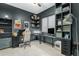 Well-lit office with gaming setup, organized shelving, and stylish decorations at 4247 S Zenith --, Mesa, AZ 85212