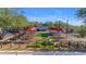 Charming outdoor seating area with picnic tables and umbrellas, ideal for community gatherings and events at 4247 S Zenith --, Mesa, AZ 85212