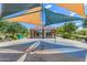 Community park shaded playground area with splashpad features and seating at 4247 S Zenith --, Mesa, AZ 85212