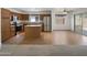 Open concept kitchen with stainless steel appliances and an island, perfect for entertaining at 44271 W Oster Dr, Maricopa, AZ 85138