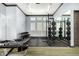 Well-equipped gym featuring weights, machines, and mirrors for a complete workout at 4516 E Walter Way, Phoenix, AZ 85050