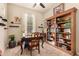 Bright home office featuring built-in shelving and a large window at 4516 E Walter Way, Phoenix, AZ 85050