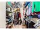 Spacious walk-in closet with ample shelving and hanging space for organized storage at 4516 E Walter Way, Phoenix, AZ 85050