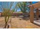 Spacious backyard featuring patio furniture, ideal for outdoor gatherings and relaxation at 5139 W Shumway Farm Rd, Laveen, AZ 85339
