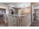 Second floor hallway featuring modern lighting and neutral carpeting and paint at 5139 W Shumway Farm Rd, Laveen, AZ 85339
