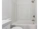 White bathtub and shower featuring chrome hardware and light walls at 520 N Stapley Dr # 123, Mesa, AZ 85203