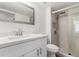 A bright bathroom features updated vanity and walk-in shower at 520 N Stapley Dr # 123, Mesa, AZ 85203