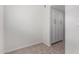 Bedroom with neutral carpet and built-in closet storage at 520 N Stapley Dr # 123, Mesa, AZ 85203