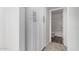 Hallway with storage and bathroom with tub in view at 520 N Stapley Dr # 123, Mesa, AZ 85203