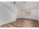 Inviting living room featuring wood floors, natural light, and staircase to the second floor at 520 N Stapley Dr # 123, Mesa, AZ 85203