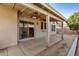 Covered patio with ceiling fan offers outdoor living and dining space at 6857 S Roosevelt St, Tempe, AZ 85283