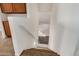 Carpeted staircase leading to a lower level at 6857 S Roosevelt St, Tempe, AZ 85283