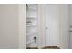 A hallway area showcasing built-in shelves, offering both functionality and a decorative element at 7952 W Oregon Ave, Glendale, AZ 85303