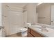 Bright bathroom with a tub, shower, and vanity with ample storage at 925 S Longmore -- # 210, Mesa, AZ 85202
