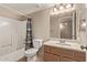 Bathroom featuring a shower-tub combo and a wood vanity with sink at 925 S Longmore -- # 210, Mesa, AZ 85202