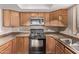 Bright kitchen with modern appliances, ample cabinetry, and neutral countertops at 925 S Longmore -- # 210, Mesa, AZ 85202