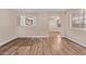 Bright living room featuring wood-look floors, neutral walls, and an open layout at 925 S Longmore -- # 210, Mesa, AZ 85202
