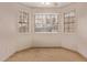 Neutral toned room with tile floor and multiple windows at 925 S Longmore -- # 210, Mesa, AZ 85202