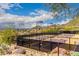 Enjoy community tennis courts with mountain views and neighborhood access on a sunny day at 13621 E Aster Dr, Scottsdale, AZ 85259