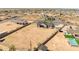 Aerial shot revealing the home's location within a community, highlighting its surrounding landscape at 34949 N Donald Way, San Tan Valley, AZ 85140