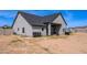 Exterior elevation showcasing a modern home design with a large, potential-filled backyard at 34949 N Donald Way, San Tan Valley, AZ 85140