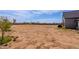 Large backyard area offering plenty of space for gardening, playing, or future expansion at 34949 N Donald Way, San Tan Valley, AZ 85140