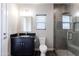 Bathroom features granite vanity, toilet, and a glass shower stall with tiled surround at 34949 N Donald Way, San Tan Valley, AZ 85140