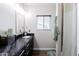 Bathroom with a marble single vanity and modern fixtures at 34949 N Donald Way, San Tan Valley, AZ 85140