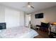 This bedroom features wood floors and a ceiling fan at 34949 N Donald Way, San Tan Valley, AZ 85140
