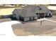 Stunning single-Gathering home featuring a modern design with stone accents and a spacious driveway at 34949 N Donald Way, San Tan Valley, AZ 85140