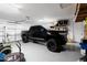 Spacious garage featuring sealed concrete floors at 34949 N Donald Way, San Tan Valley, AZ 85140