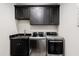 The laundry room features gray countertops and modern appliances at 34949 N Donald Way, San Tan Valley, AZ 85140