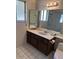 Bathroom with large mirror over sink and a window at 4741 W Annette Cir, Glendale, AZ 85308