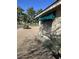 Close up view of brick home with green awning over the window and clean landscaping at 4741 W Annette Cir, Glendale, AZ 85308