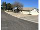 This house features a well-manicured landscape and attached two-car garage at 4741 W Annette Cir, Glendale, AZ 85308