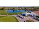 Picturesque golf course view with pond, golf carts, and The Bellaire Bar at 4741 W Annette Cir, Glendale, AZ 85308