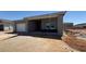 A single Gathering home in a new development with a garage and covered entryway, showing clear sky at 11429 E Utah Ave, Mesa, AZ 85212