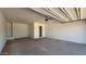 Spacious garage with neutral paint at 11429 E Utah Ave, Mesa, AZ 85212